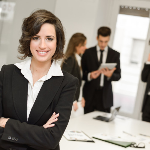 Business leader looking at camera in working environment Image of businesswoman leader looking at camera in working environment